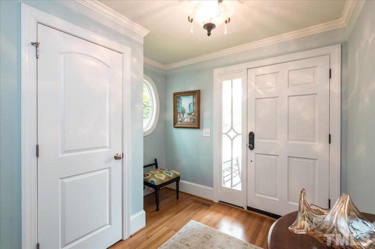 2901 Hostetler Street Raleigh, NC 27609 - Photo 3 of 25 a view of a livingroom with wooden floor and closet
