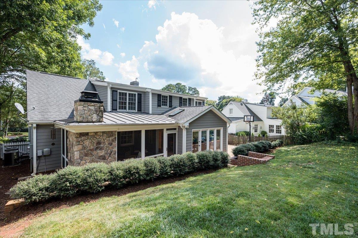 2901 Hostetler Street Raleigh, NC 27609 - Photo 22 of 25 a front view of a house with a garden