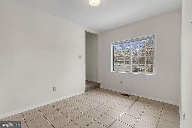 a kitchen with stainless steel appliances a sink and cabinets