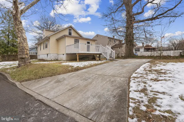 a house with trees in front of it