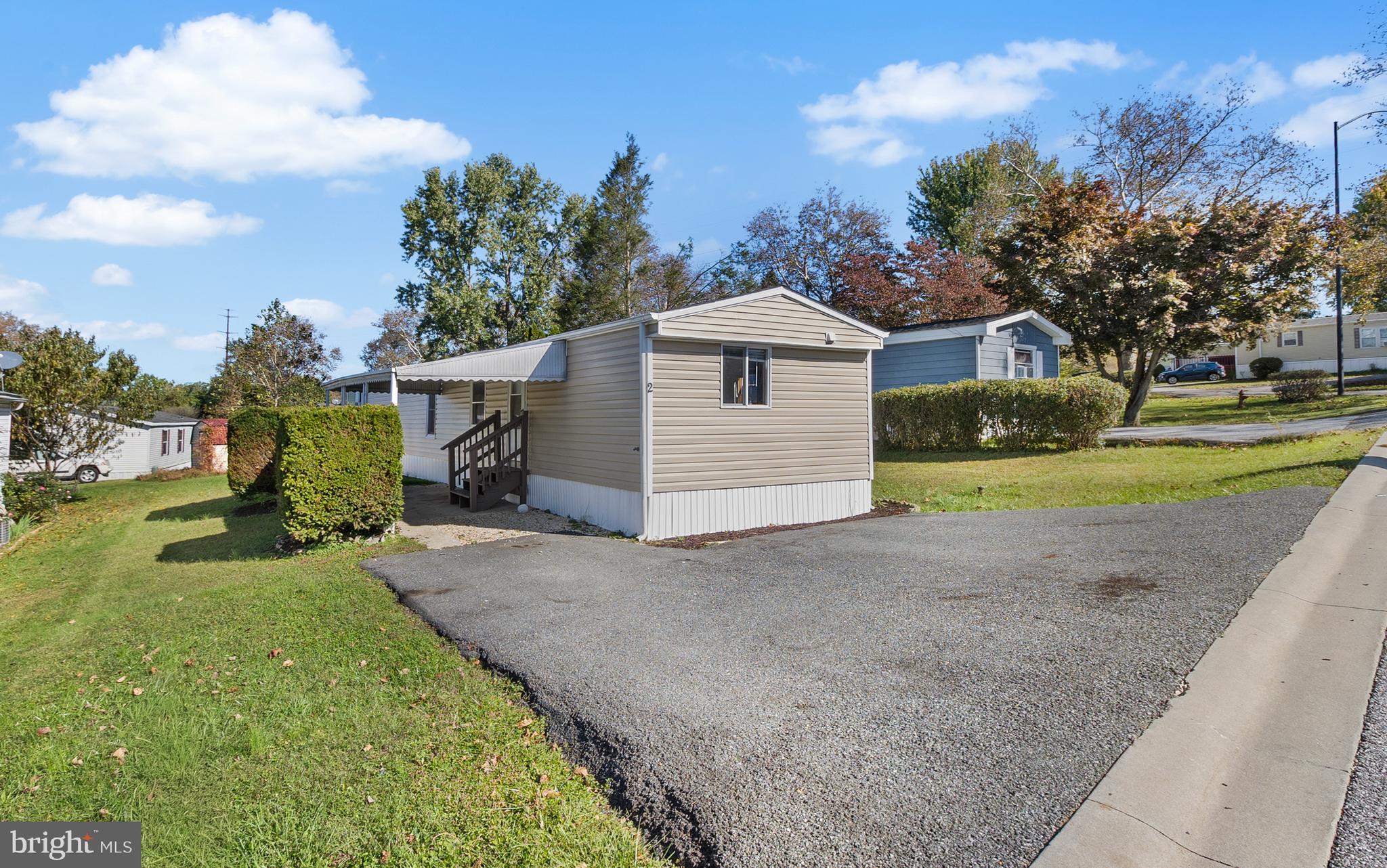 2 Westview Way West Grove, PA 19390 - Photo 21 of 26 a view of a house with a yard and large tree