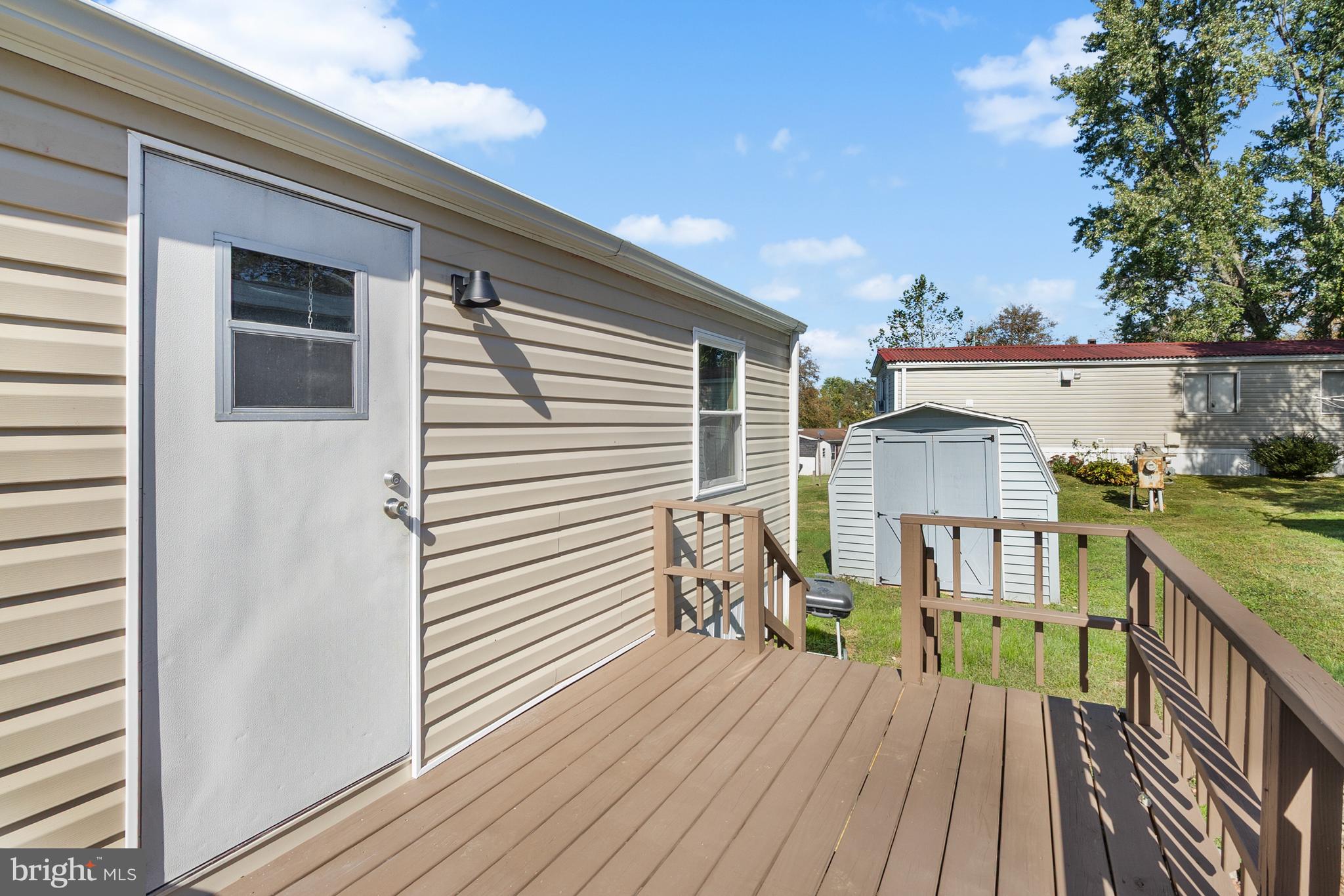 2 Westview Way West Grove, PA 19390 - Photo 26 of 26 a view of a balcony with two chairs and wooden floor