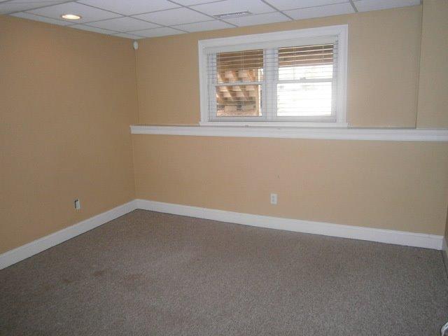 57 Long Hill Road Pocasset, MA 02559 - Photo 3 of 18 an empty room with a window