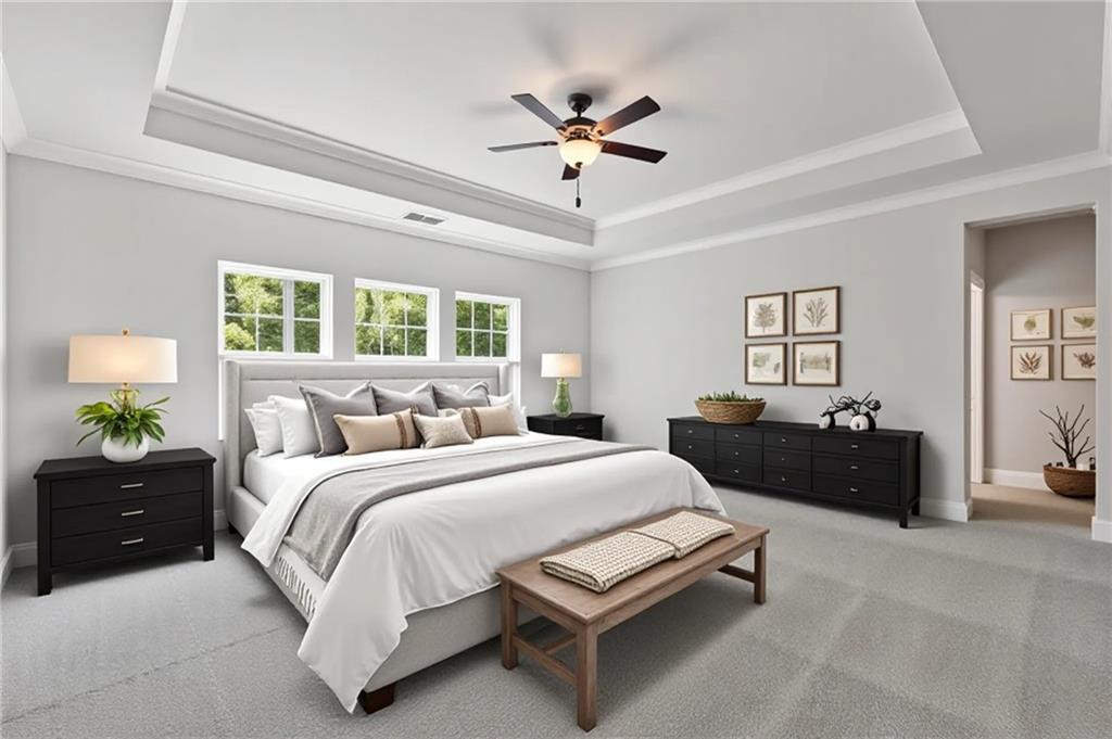 3832 Cheyenne Lane Jefferson, GA 30549 - Photo 9 of 19 a spacious bedroom with a bed and a couch