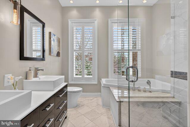1740 13th Street Northwest Washington, DC 20009 - Photo 11 of 82 a bathroom with a sink large mirror and a bathtub