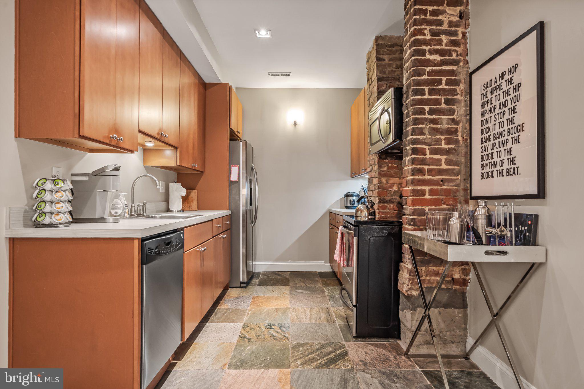 1740 13th Street Northwest Washington, DC 20009 - Photo 31 of 40 Charming LL kitchen with rustic accents.