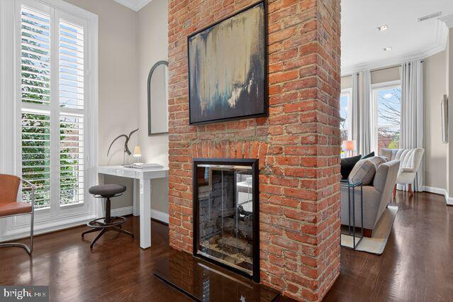 1740 13th Street Northwest Washington, DC 20009 - Photo 34 of 82 a living room with furniture and a fireplace