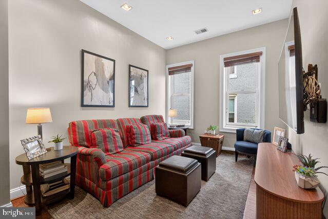 1740 13th Street Northwest Washington, DC 20009 - Photo 62 of 82 a living room with furniture and a lamp