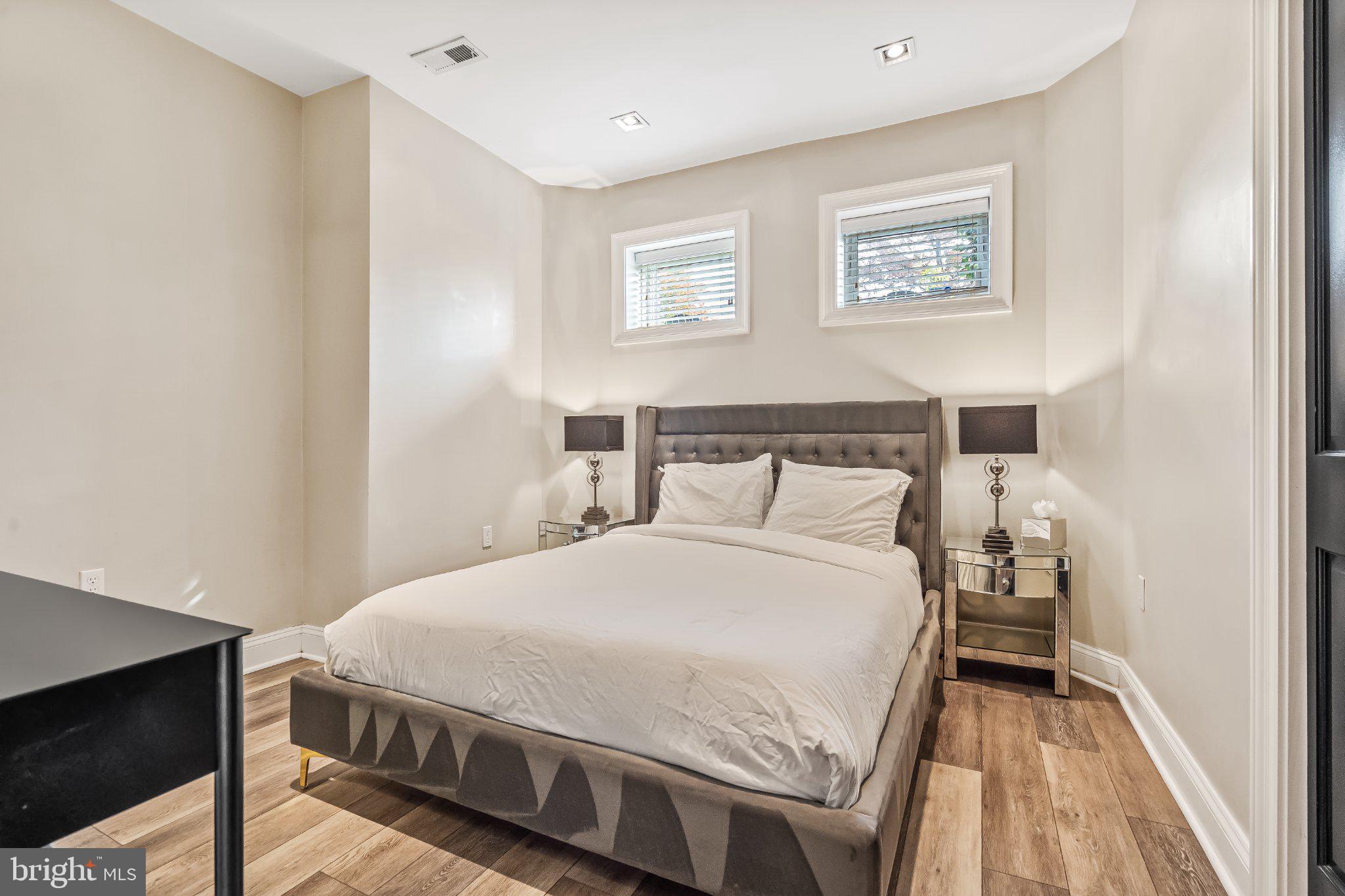 1740 13th Street Northwest Washington, DC 20009 - Photo 75 of 82 a bedroom with a bed and wooden floor