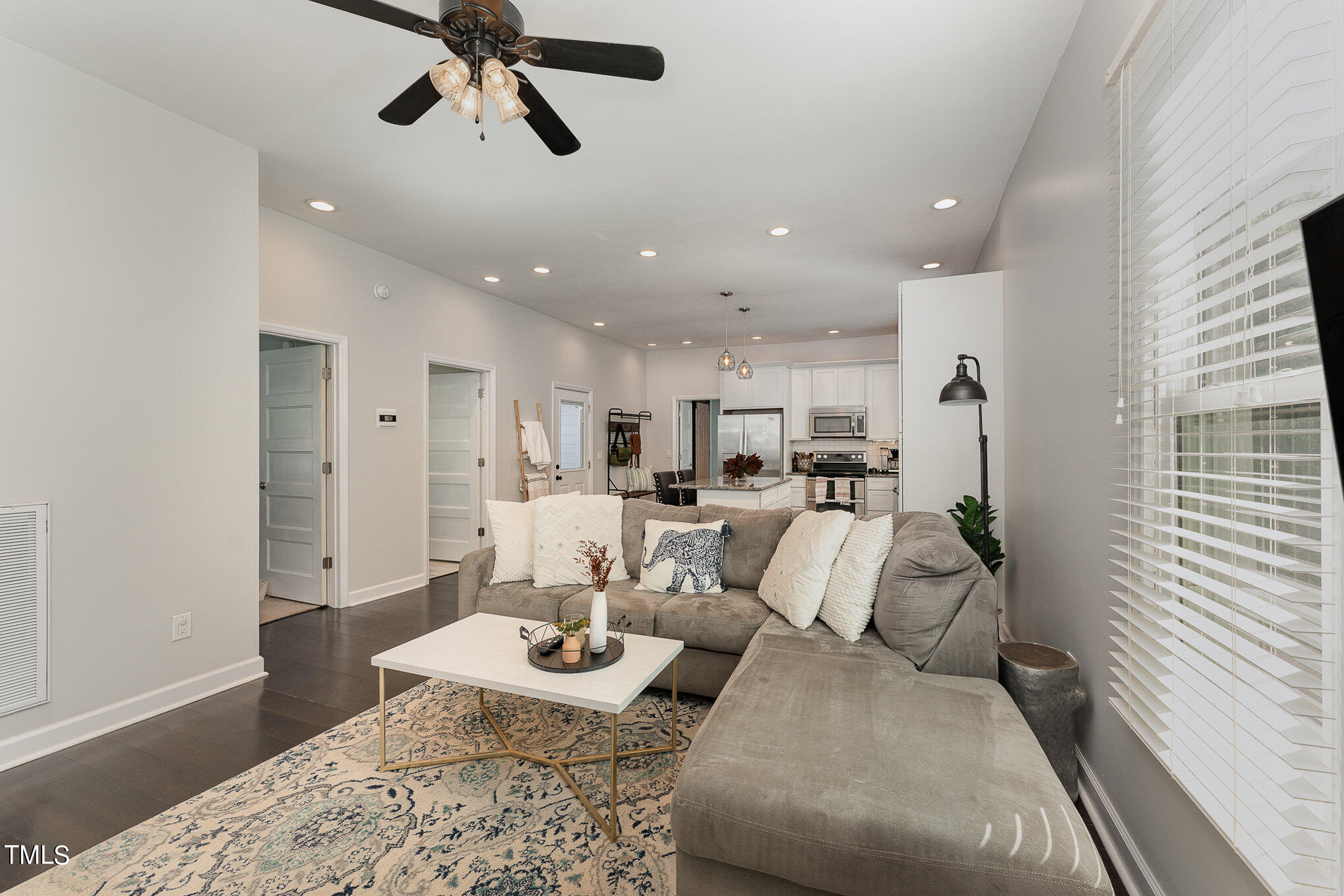 320 East Lee Street Raleigh, NC 27601 - Photo 4 of 31 a living room with furniture and a window