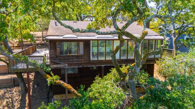 a view of a house with a iron gate