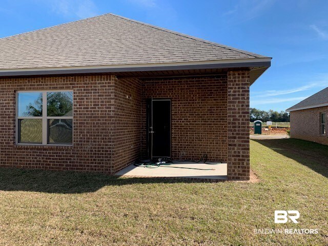 9439 Eiland Drive, Unit 38 Foley, AL 36535 - Photo 16 of 20 Rear Covered Porch
