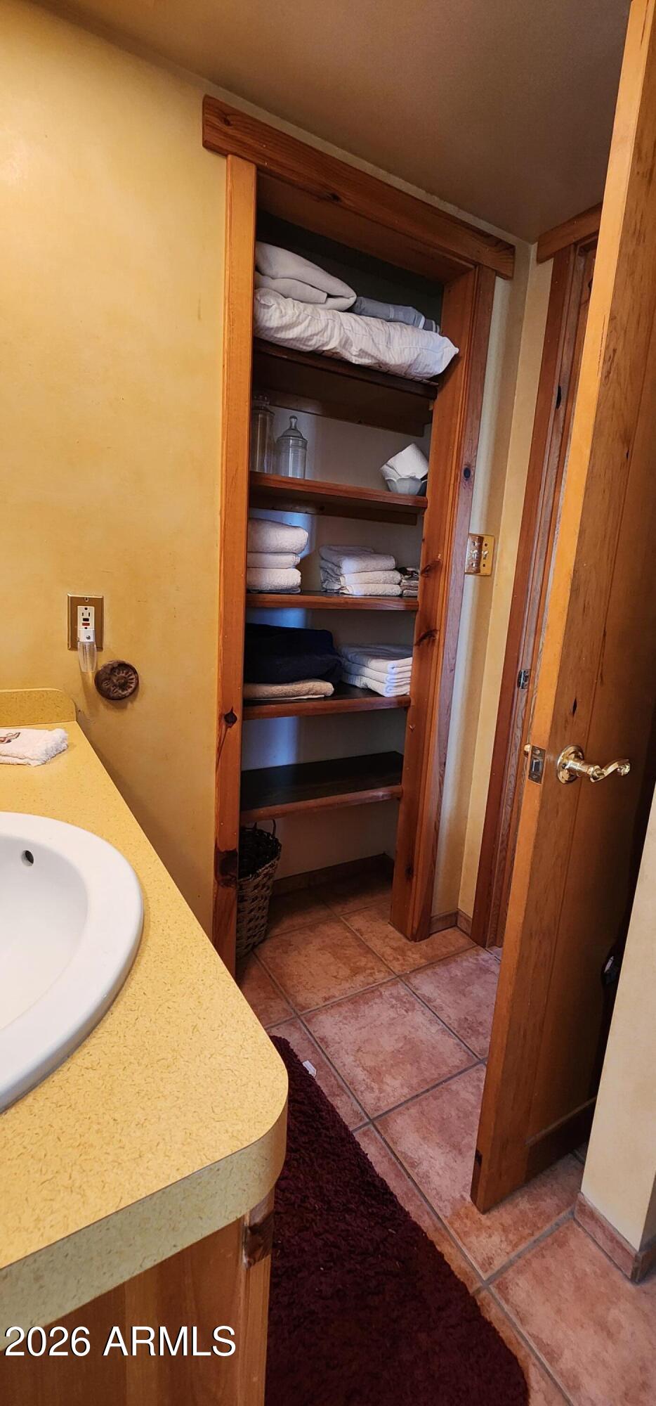 27675 State Highway 89 Congress, AZ 85332 - Photo 11 of 18 a bathroom with a sink and a mirror