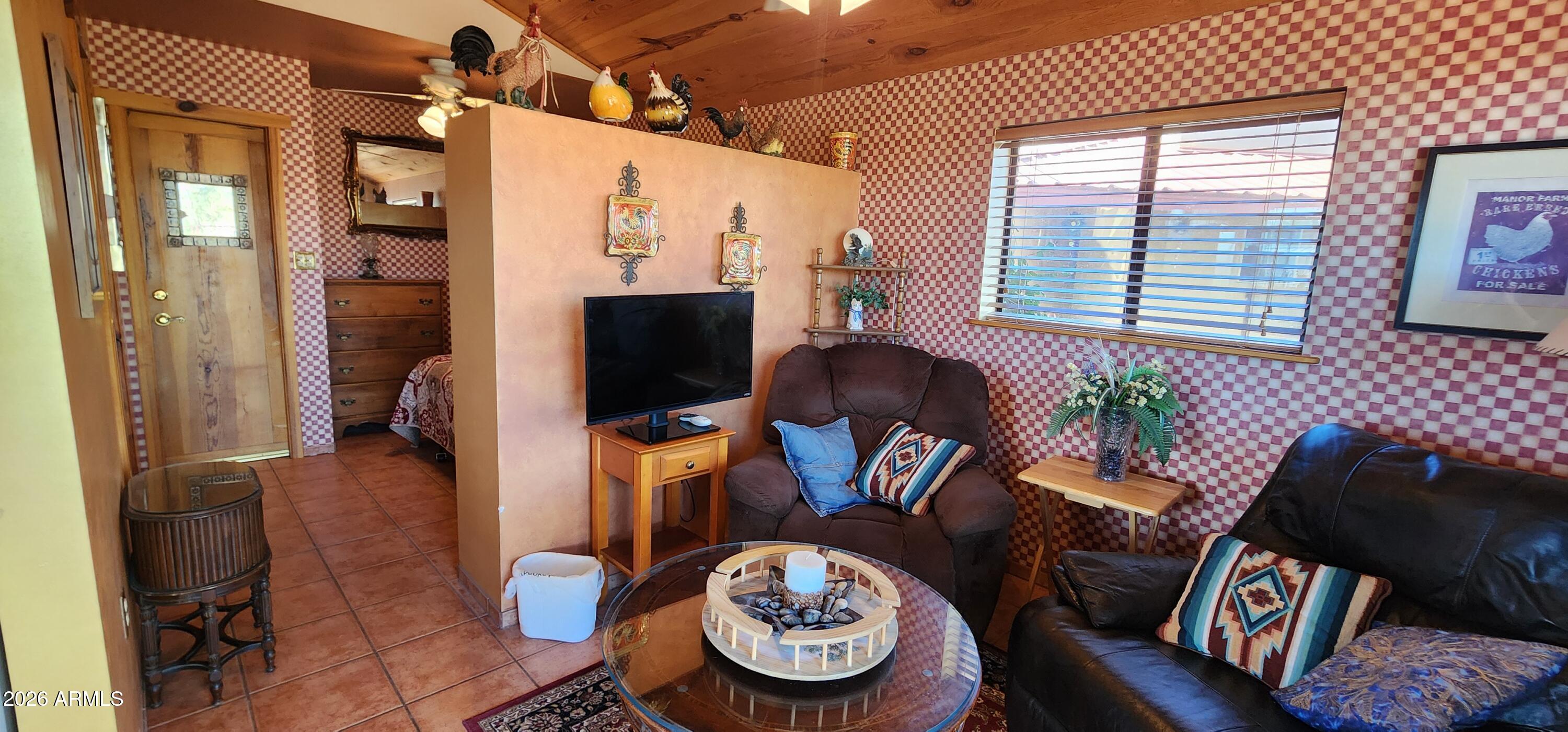 27675 State Highway 89 Congress, AZ 85332 - Photo 4 of 18 a living room with furniture and a large window