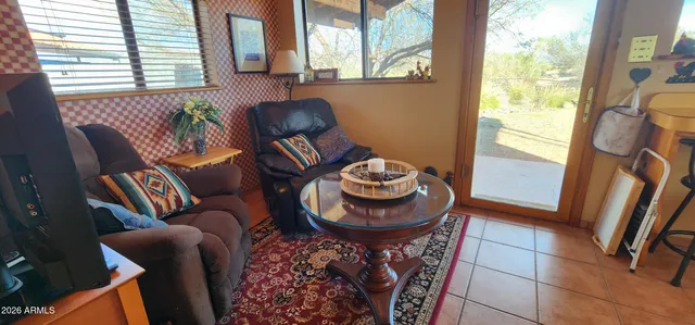 a view of balcony with furniture