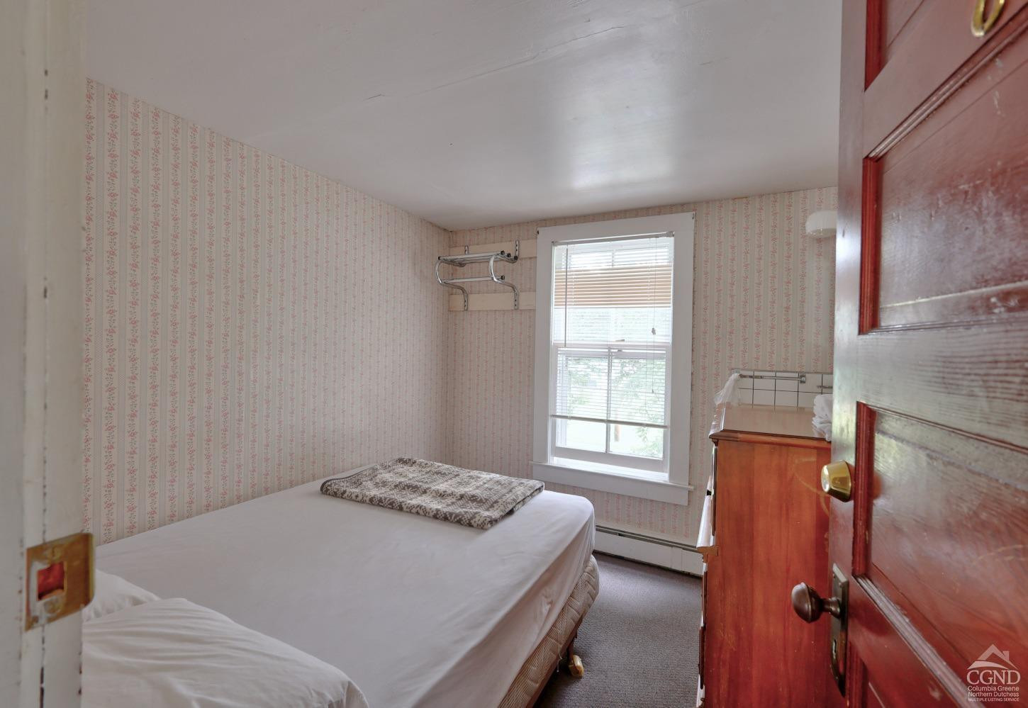 899-907 Red Mill Road Greenville, NY 12083 - Photo 36 of 99 a bedroom with a bed and a window