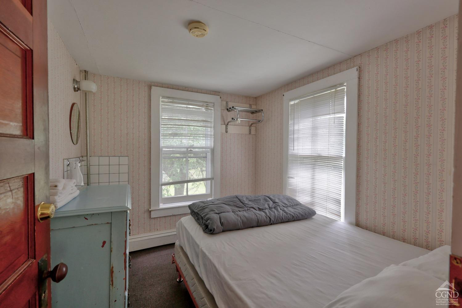 899-907 Red Mill Road Greenville, NY 12083 - Photo 37 of 99 a bedroom with a bed and a window