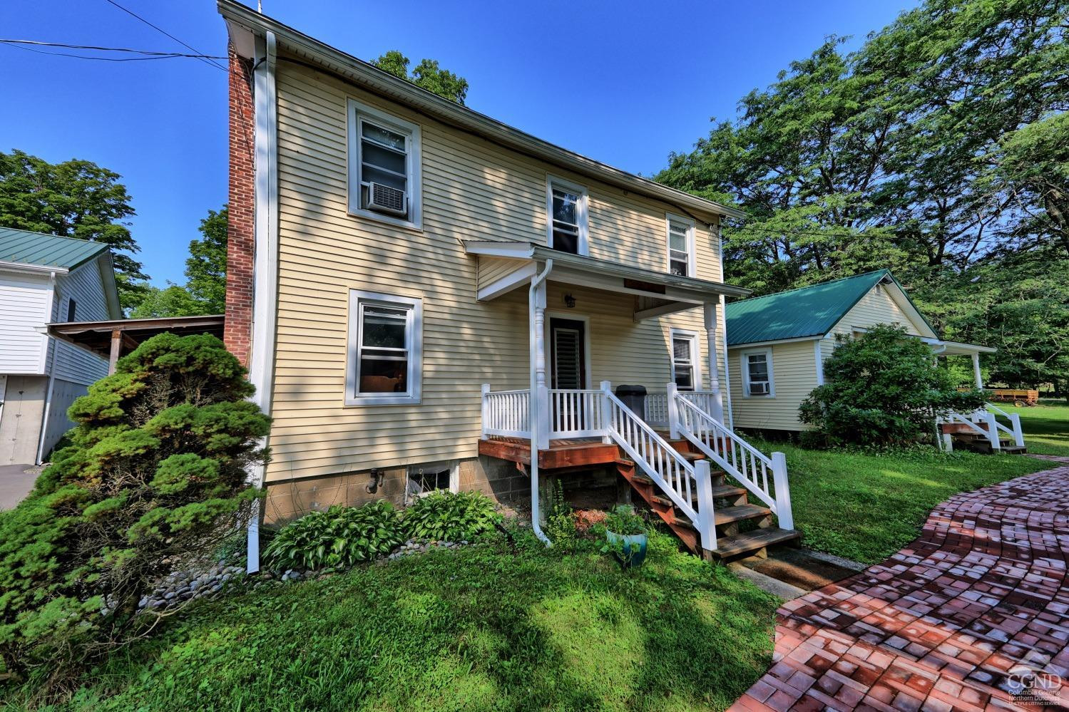 899-907 Red Mill Road Greenville, NY 12083 - Photo 38 of 99 a front view of house with yard and green space