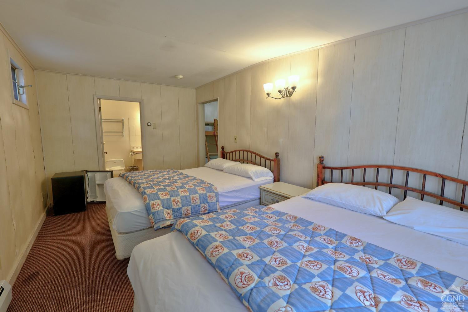 899-907 Red Mill Road Greenville, NY 12083 - Photo 46 of 99 a bedroom with two beds and a lamp