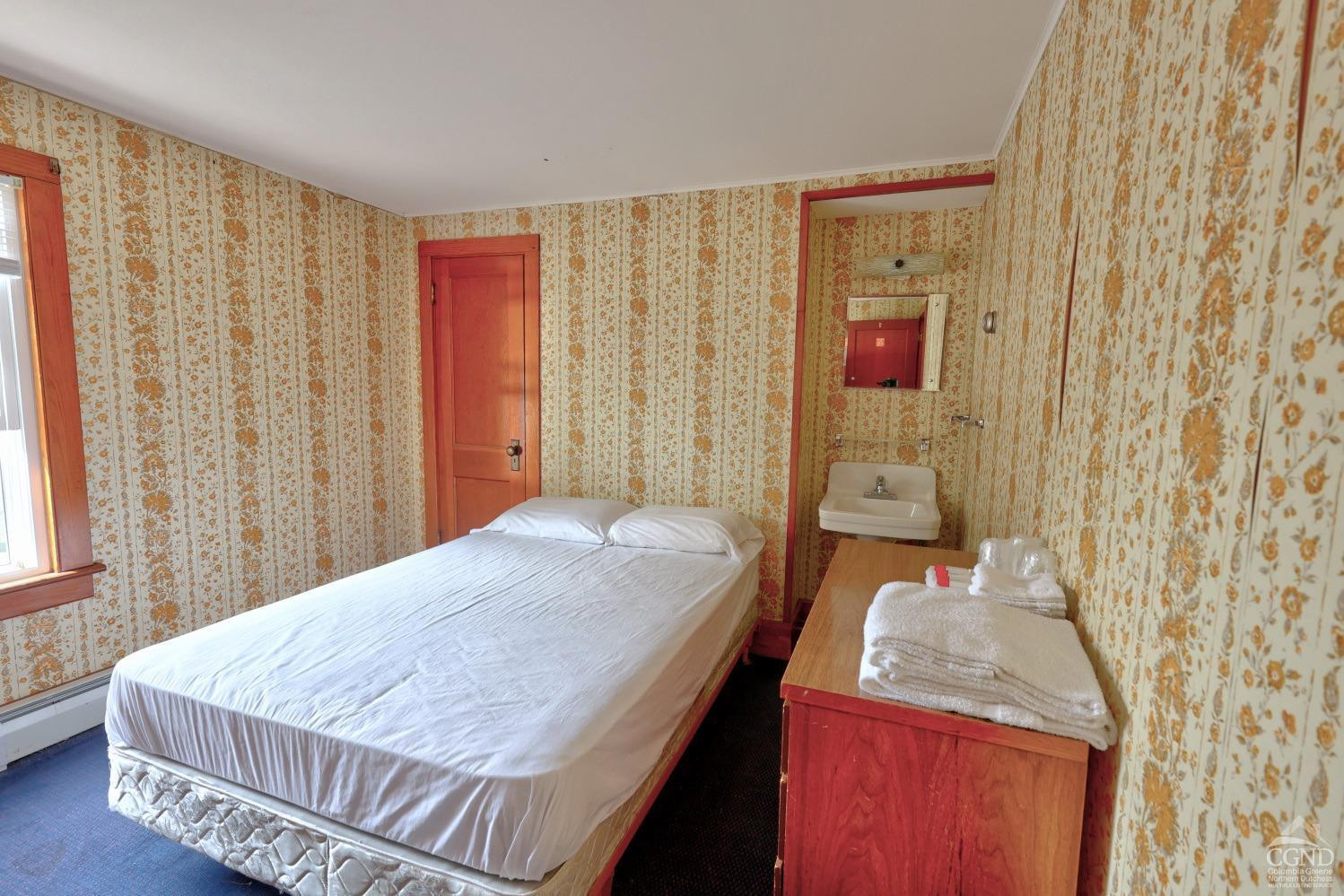 899-907 Red Mill Road Greenville, NY 12083 - Photo 51 of 99 a bedroom with a bed and a window