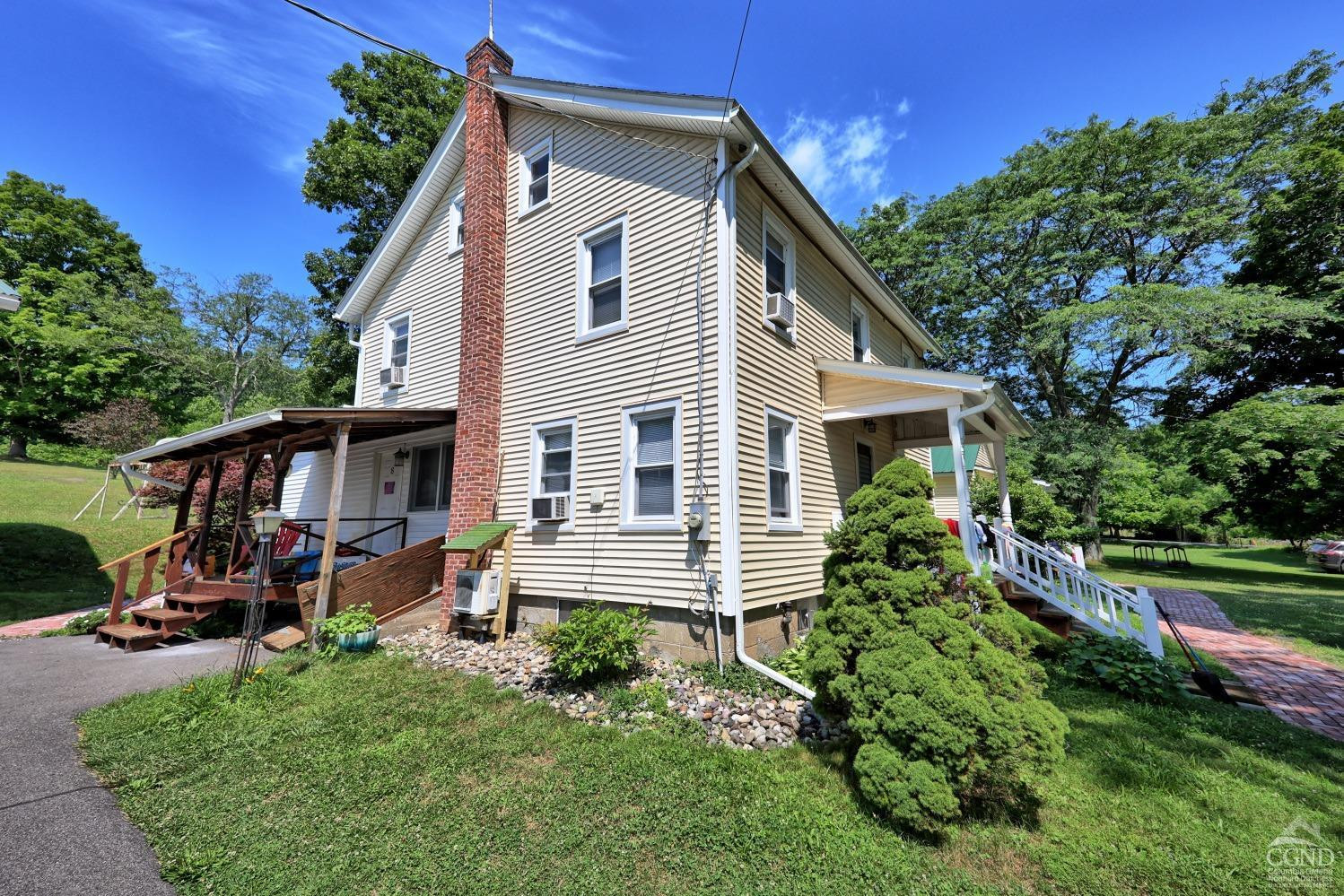 899-907 Red Mill Road Greenville, NY 12083 - Photo 83 of 99 a front view of a house with a yard
