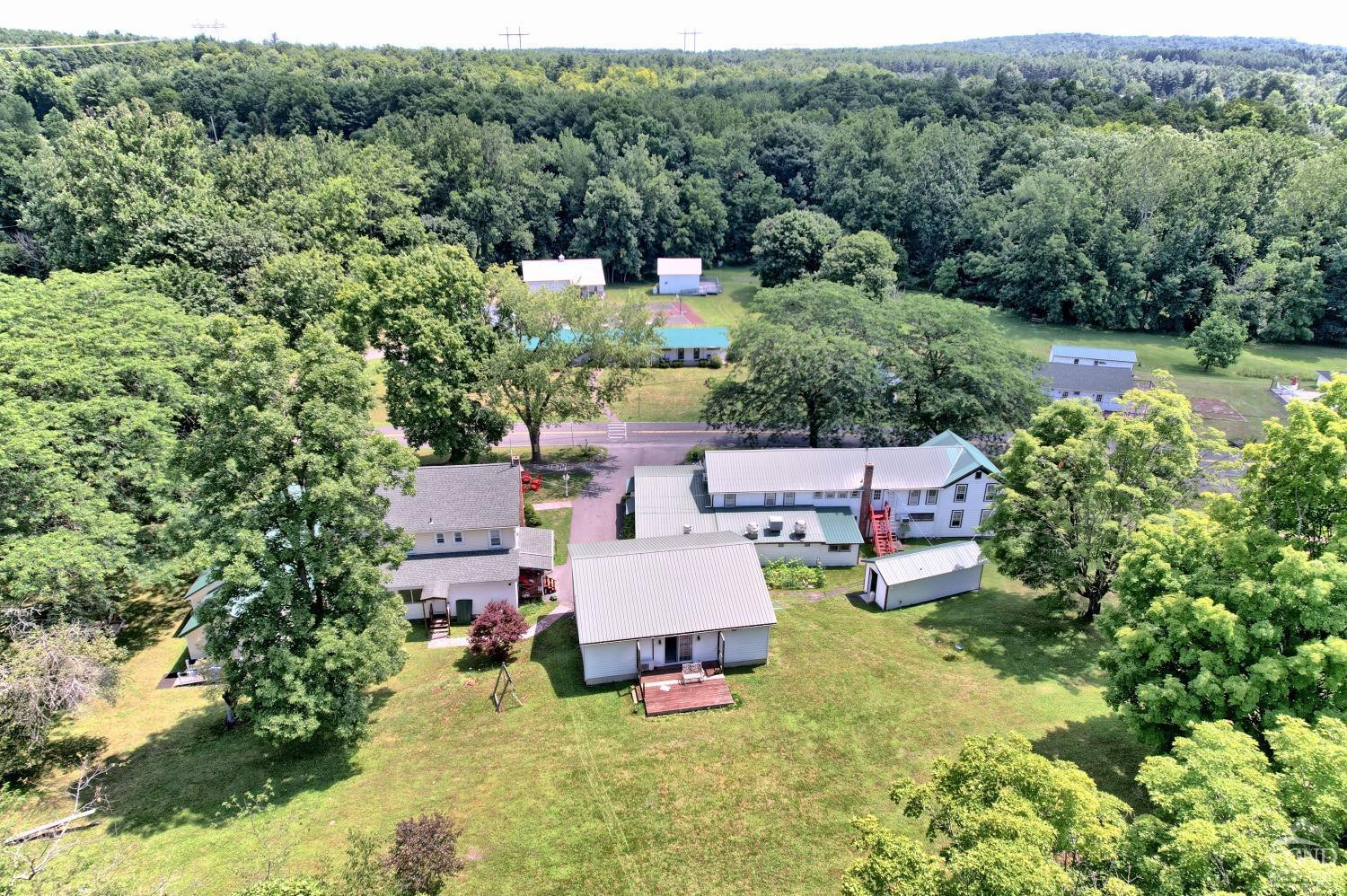 899-907 Red Mill Road Greenville, NY 12083 - Photo 93 of 99 an aerial view of a house with swimming pool outdoor seating and yard