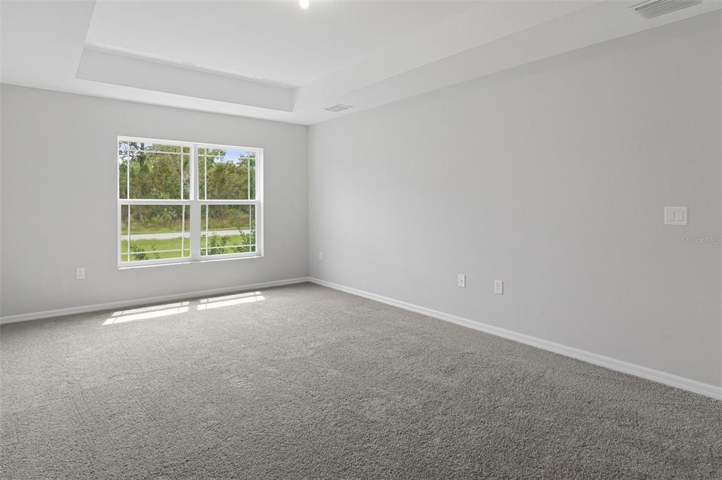 79 Daisy Street Homosassa, FL 34446 - Photo 17 of 36 an empty room with a window