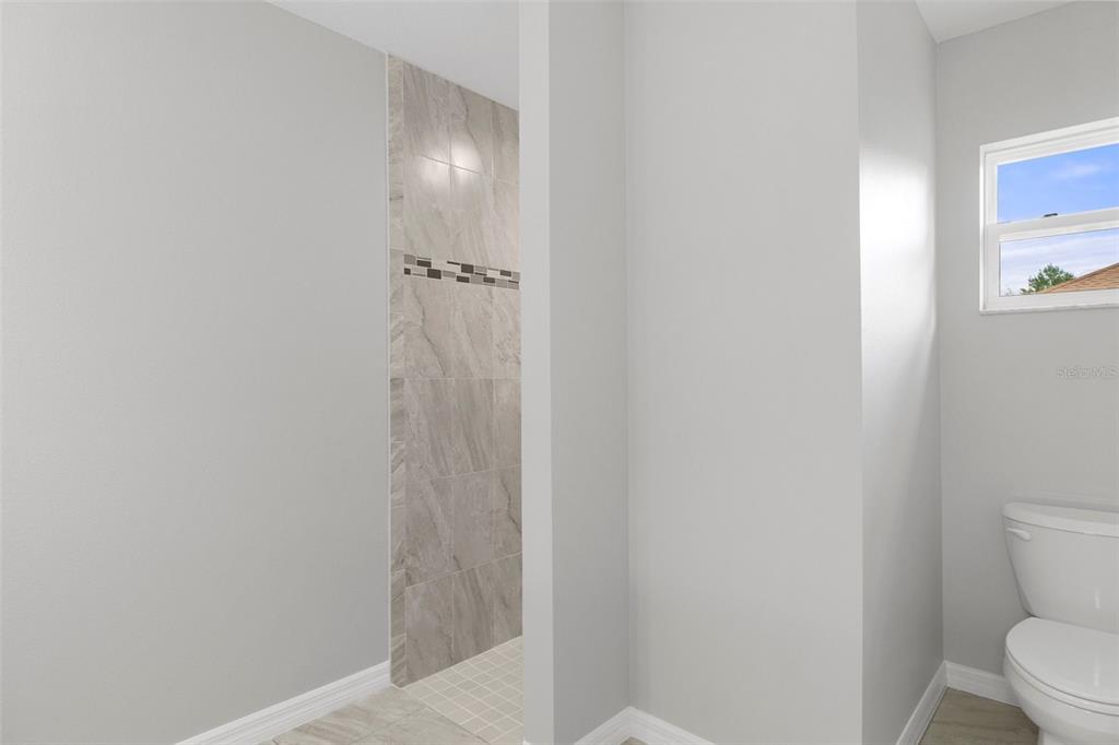 79 Daisy Street Homosassa, FL 34446 - Photo 27 of 36 a bathroom with a shower