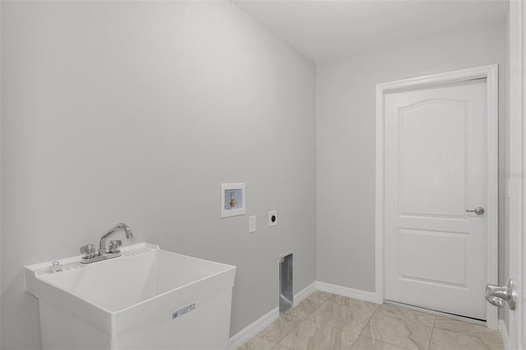 79 Daisy Street Homosassa, FL 34446 - Photo 34 of 36 a bathroom with a sink and vanity