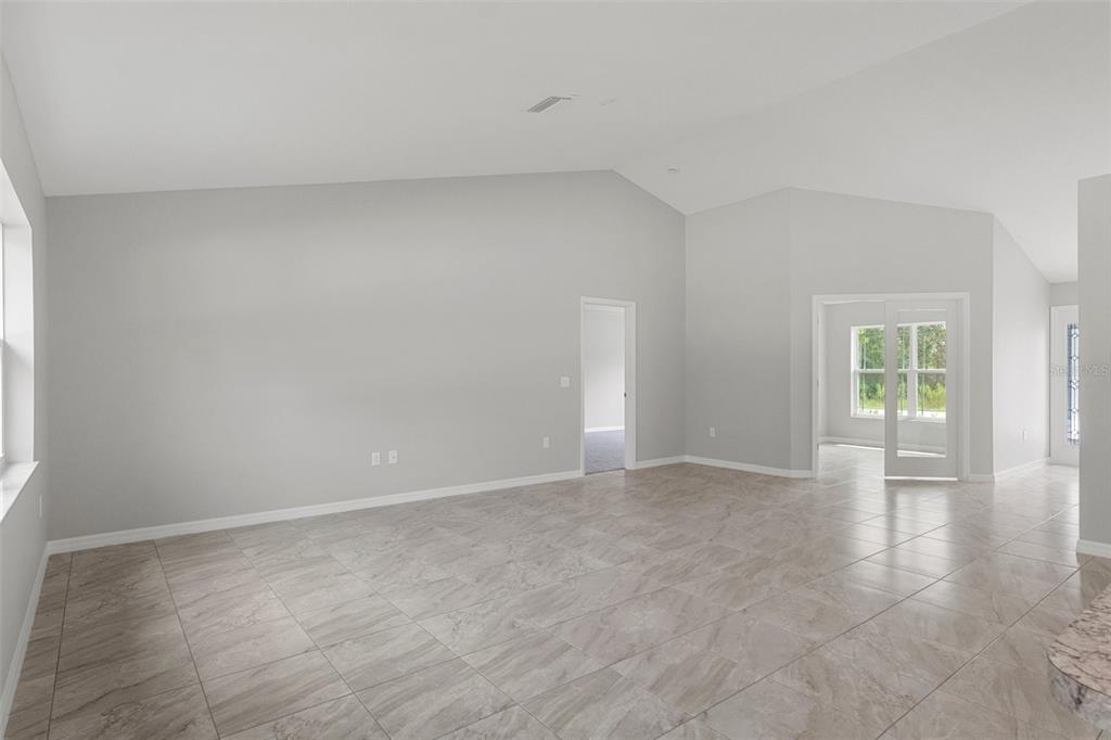 79 Daisy Street Homosassa, FL 34446 - Photo 8 of 36 a view of an empty room and window