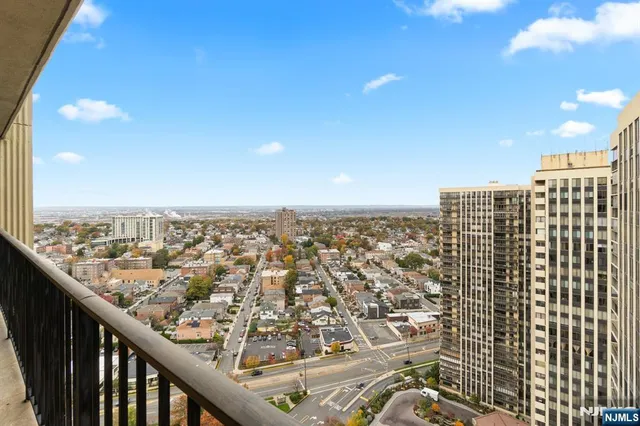 a view of a city from a balcony