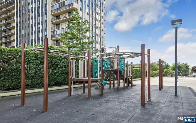 a view of a building with sitting area