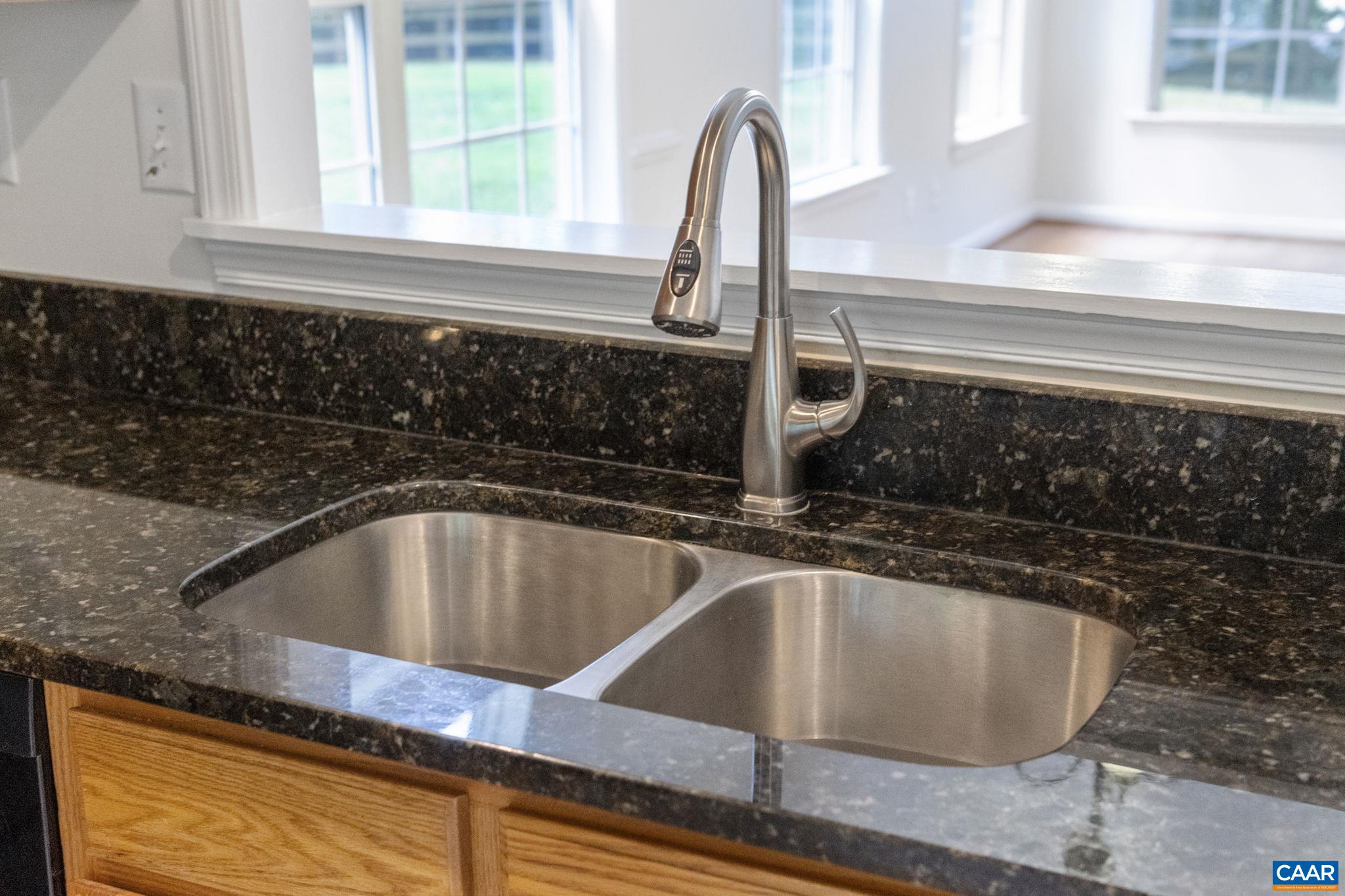298 Northridge Road Ruckersville, VA 22968 - Photo 11 of 33 a kitchen with a sink and a window