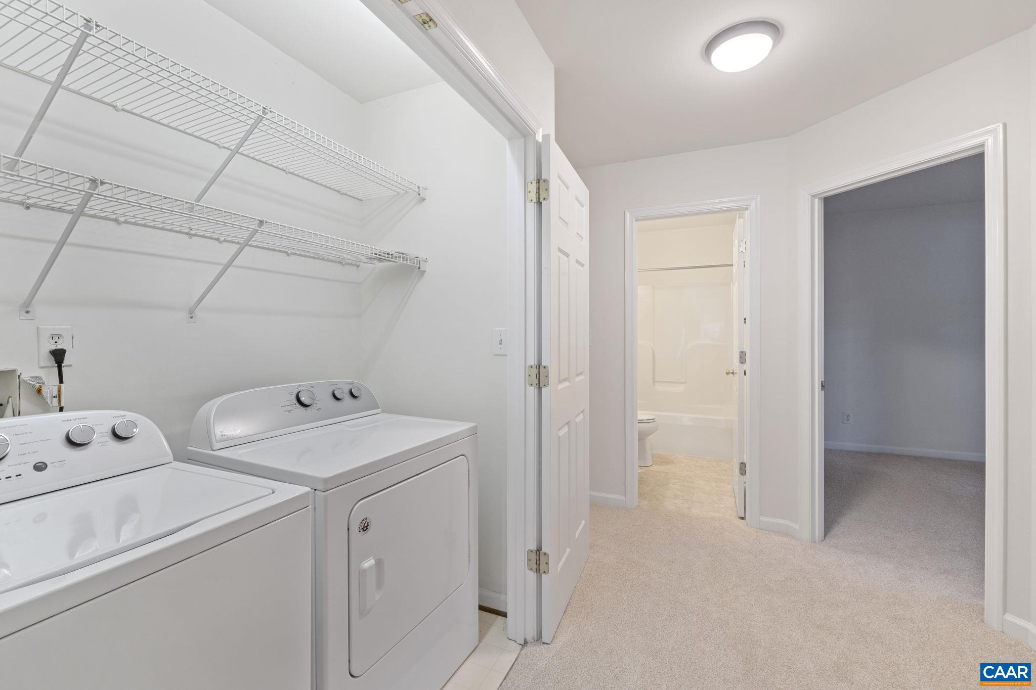 298 Northridge Road Ruckersville, VA 22968 - Photo 21 of 33 a view of storage and utility room with washer and dryer