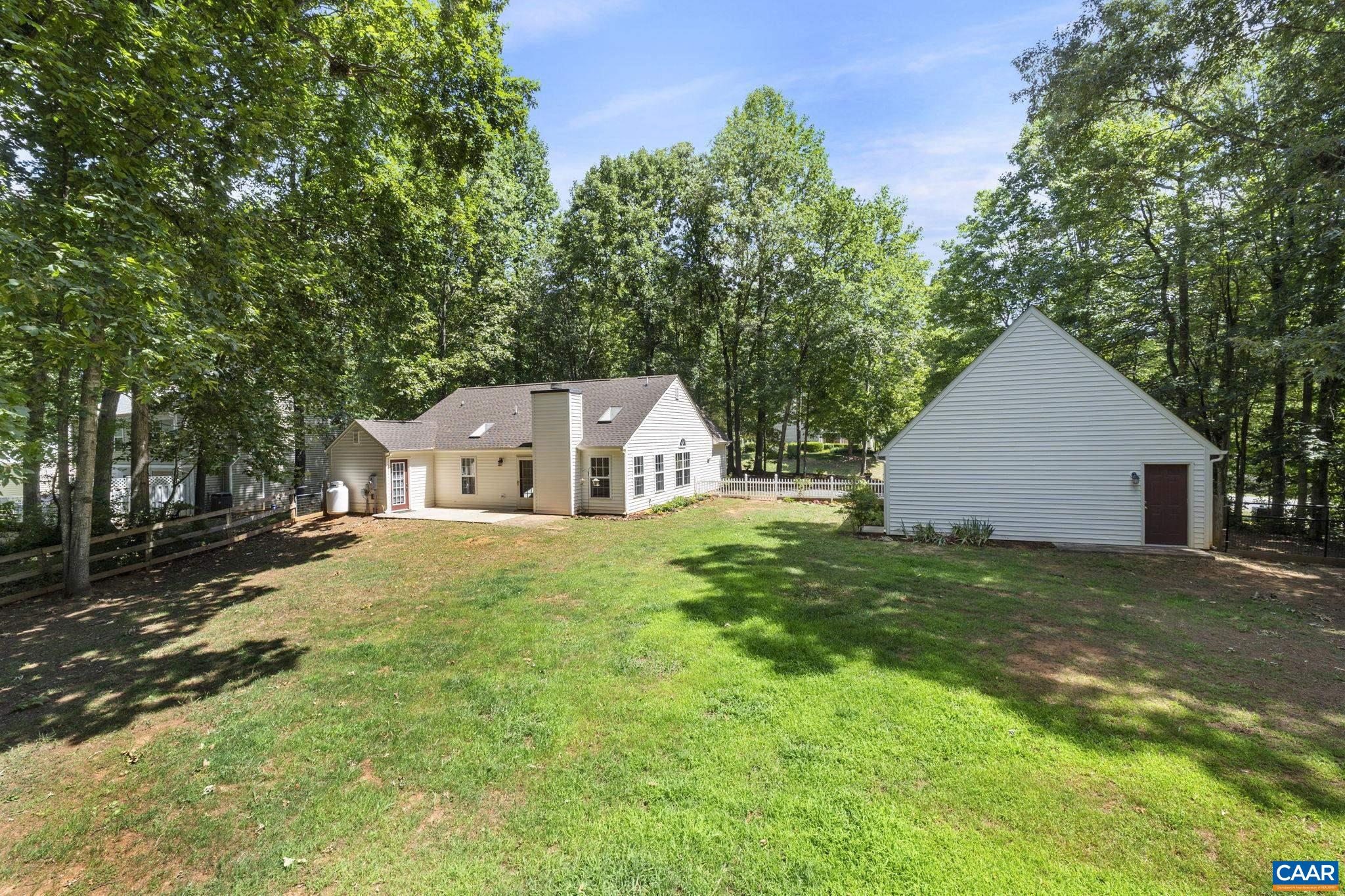 298 Northridge Road Ruckersville, VA 22968 - Photo 30 of 33 a house with green field in front of it