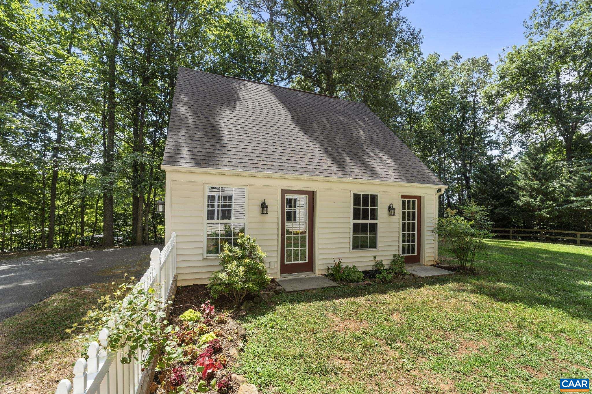 298 Northridge Road Ruckersville, VA 22968 - Photo 7 of 33 front view of a house with a yard