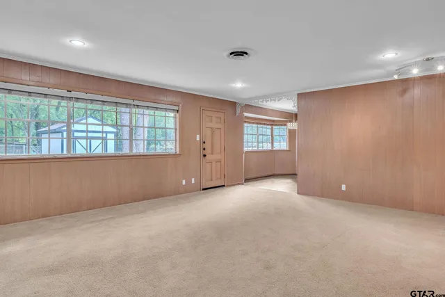 an empty room with windows