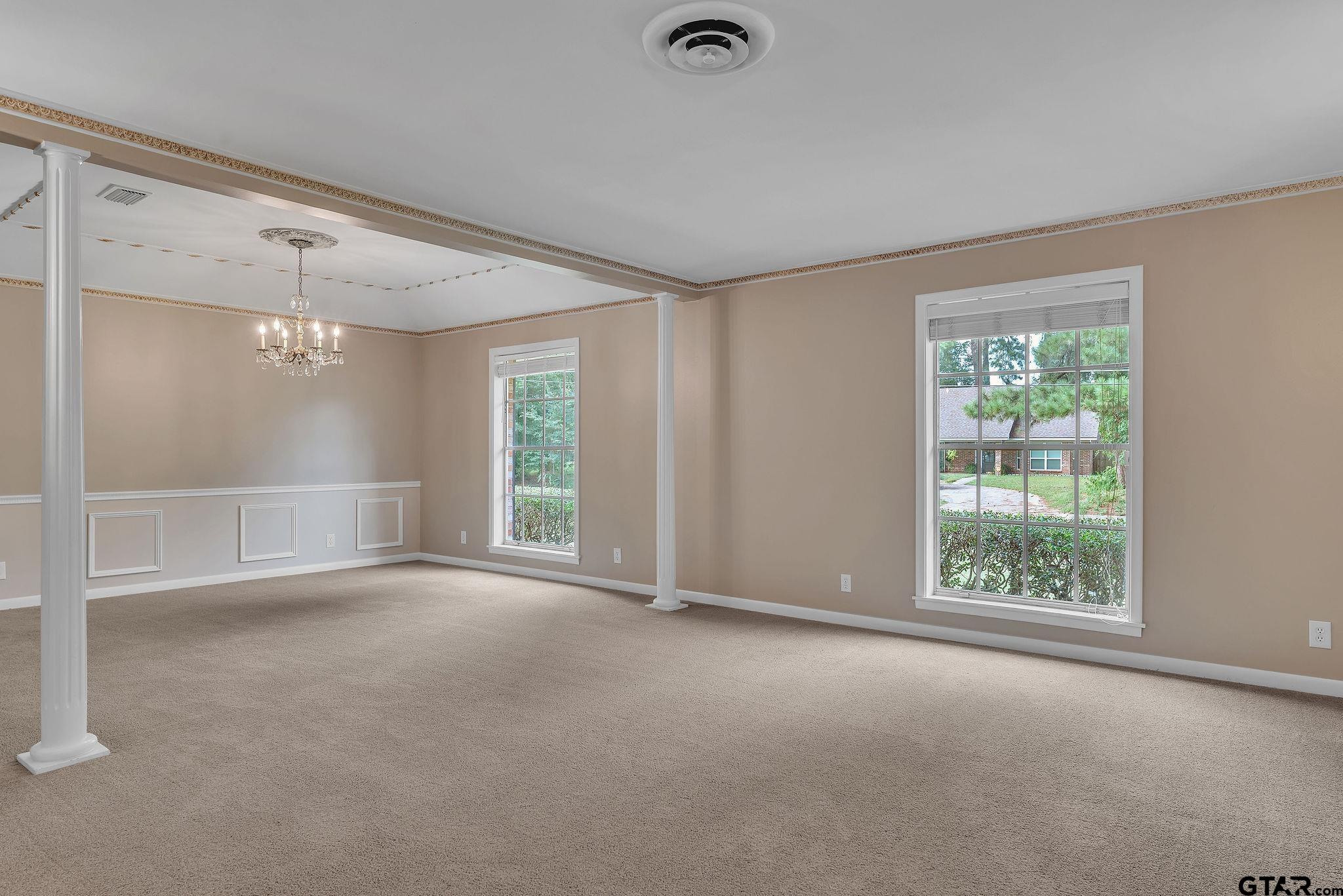 700 Emily Drive Longview, TX 75601 - Photo 4 of 45 an empty room with windows and closet