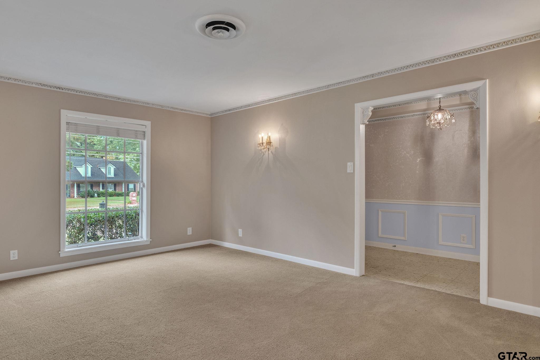 700 Emily Drive Longview, TX 75601 - Photo 5 of 45 an empty room with windows and closet