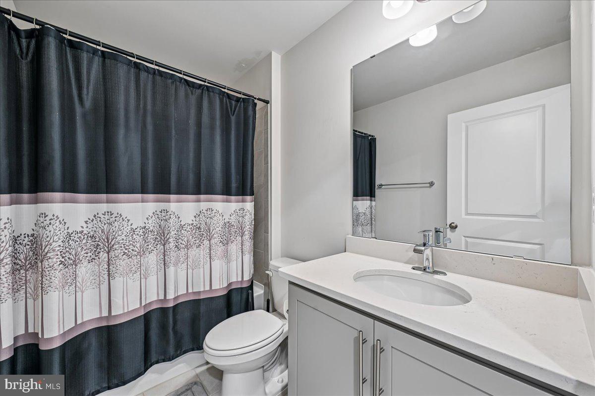 6619 Darter Way Clinton, MD 20735 - Photo 19 of 20 Modern full bathroom with sleek vanity