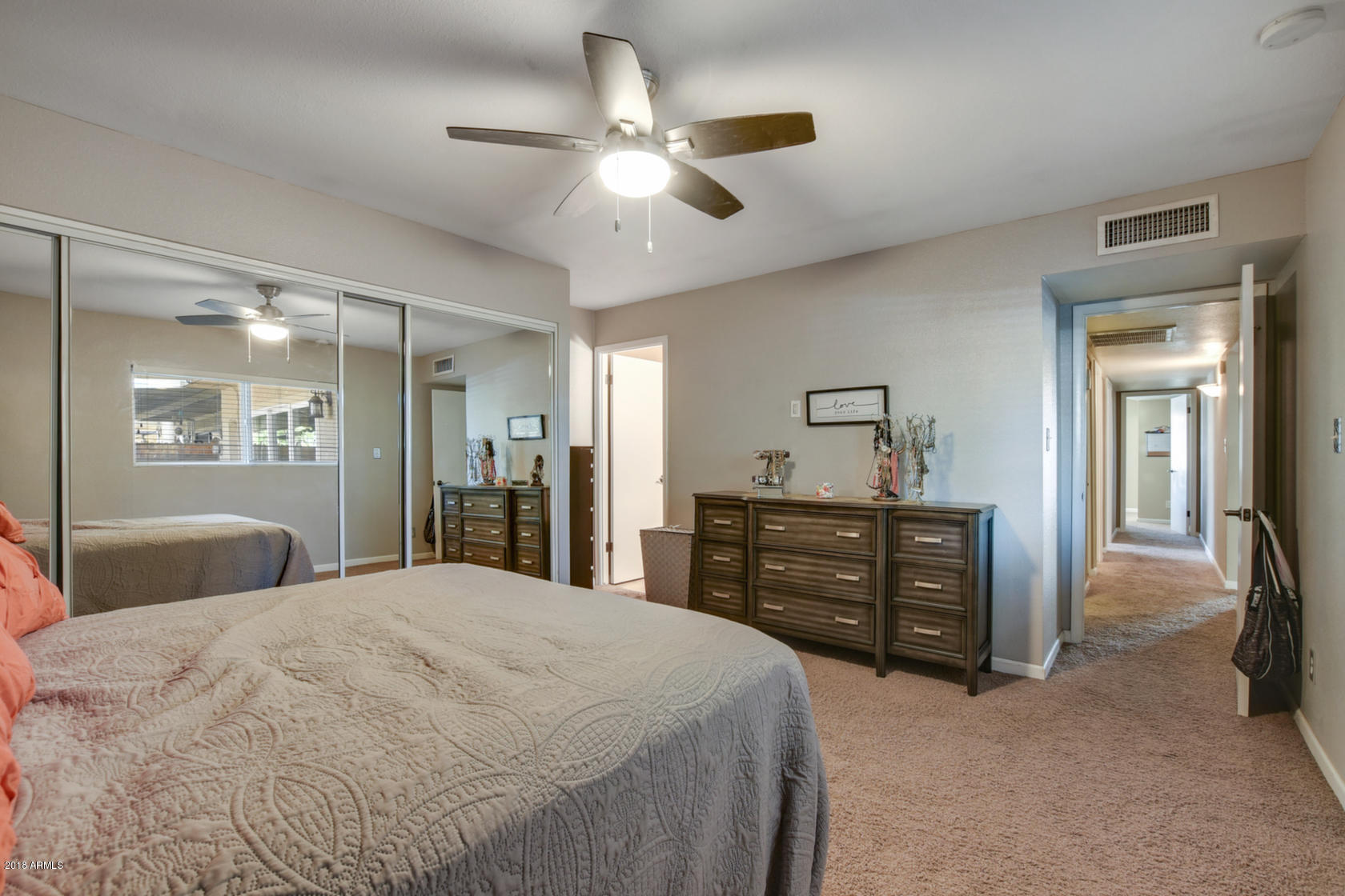 5910 North Granite Reef Road Scottsdale, AZ 85250 - Photo 6 of 33 a bedroom with a bed and a dresser