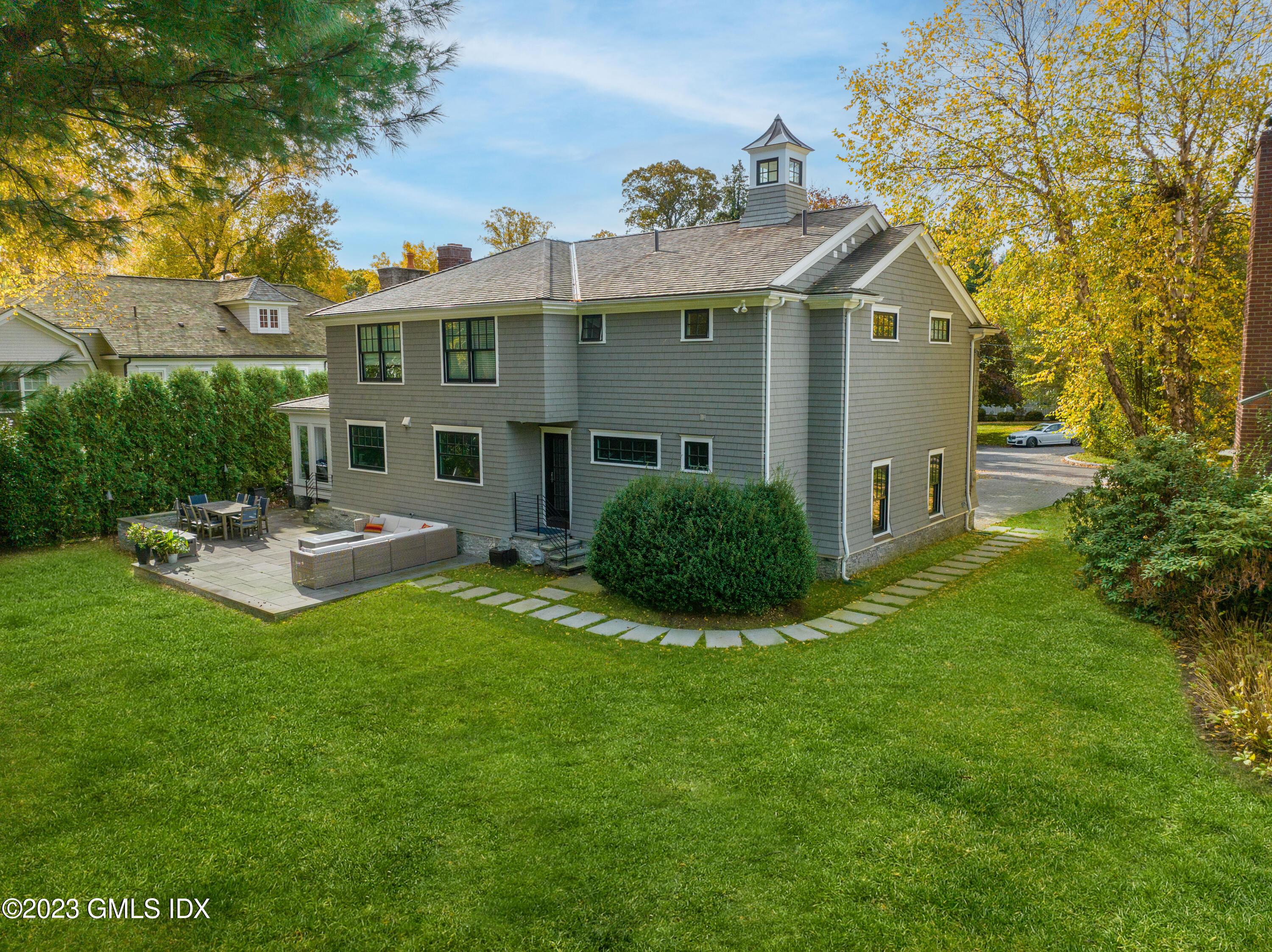 11 Colonial Lane Riverside, CT 06878 - Photo 32 of 37 a view of a house with a backyard