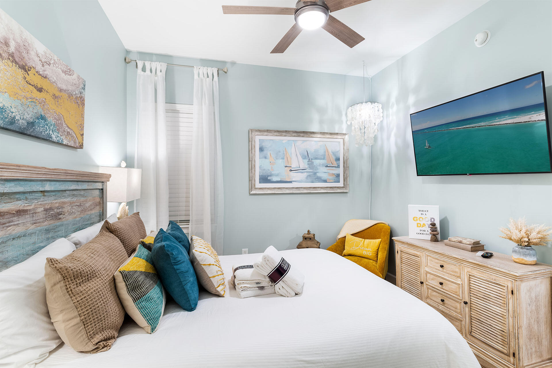 231 Somerset Bridge Road, Unit 2105 Santa Rosa Beach, FL 32459 - Photo 5 of 27 a bedroom with a bed and a flat screen tv