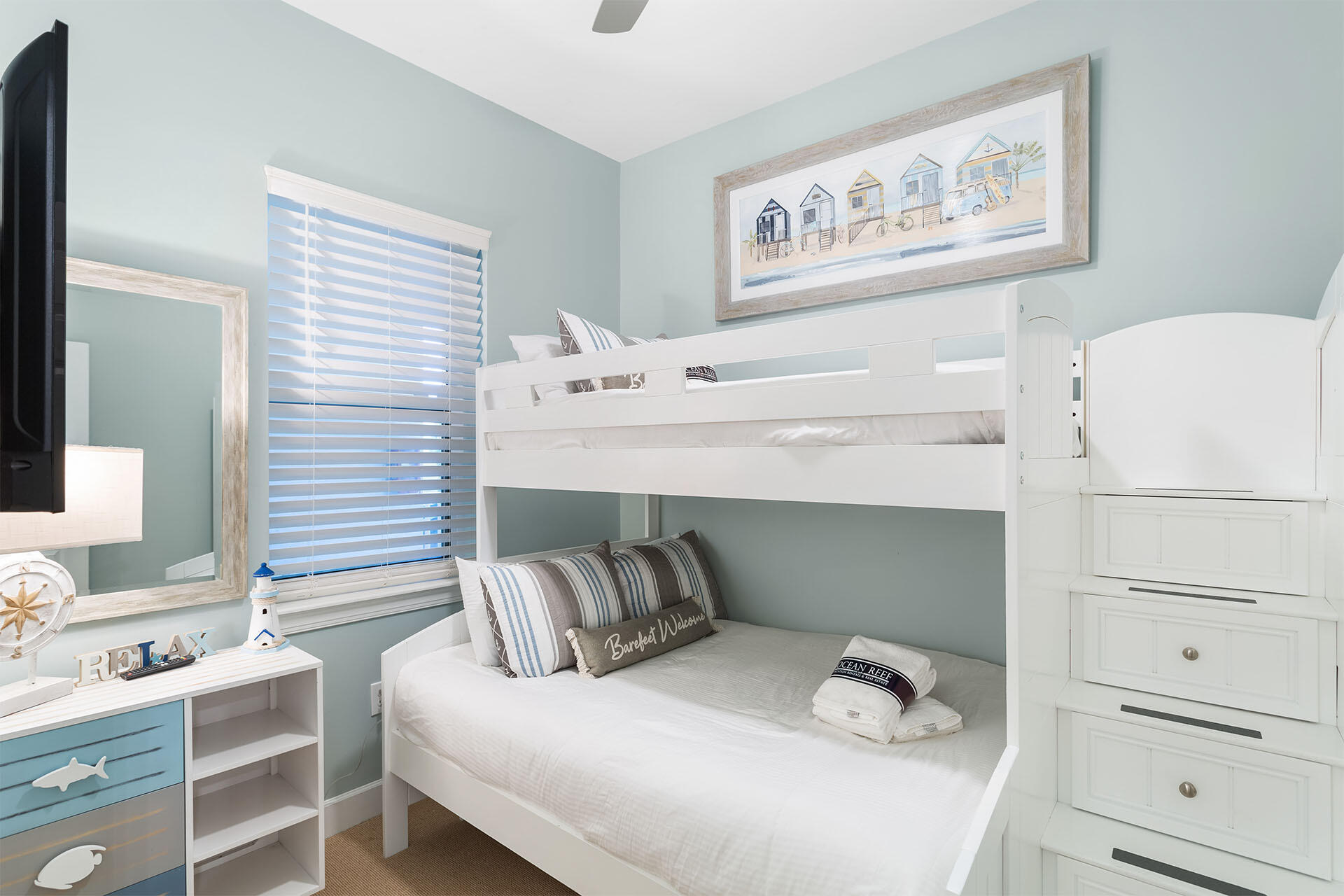 231 Somerset Bridge Road, Unit 2105 Santa Rosa Beach, FL 32459 - Photo 7 of 27 a bedroom with a bed and a cabinets