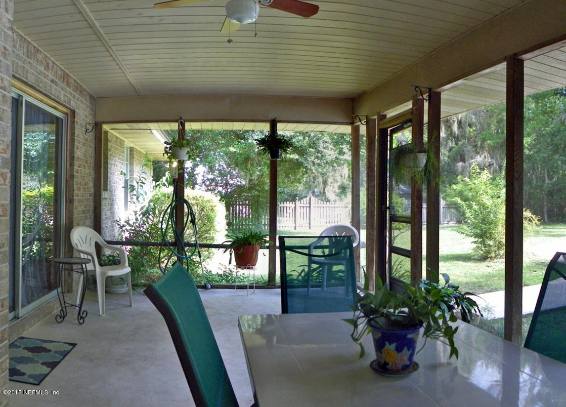 343 Holly Knowe Road Fleming Island, FL 32003 - Photo 2 of 23 Screened Lanai