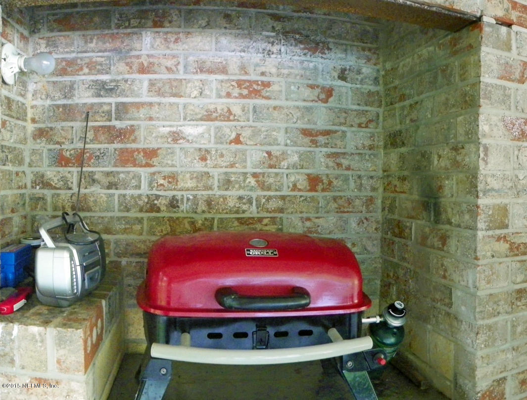 343 Holly Knowe Road Fleming Island, FL 32003 - Photo 21 of 23 Lanai Grill Area & Chimney
