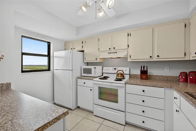 a bedroom with bed and window