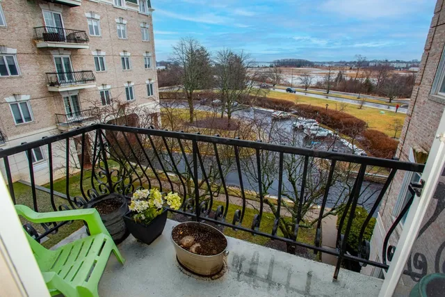 a view of a balcony with lake view