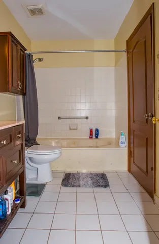 a bathroom with a bathtub and a sink