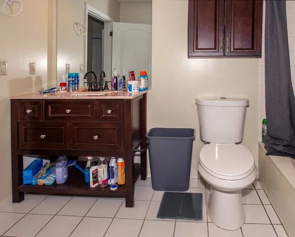 a bathroom with a toilet and a sink